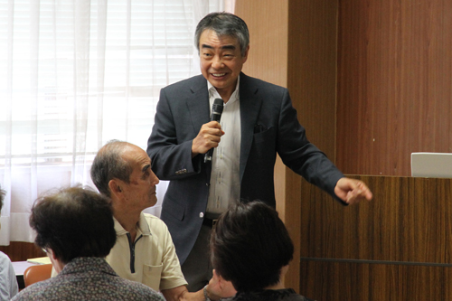 講演する天野会長